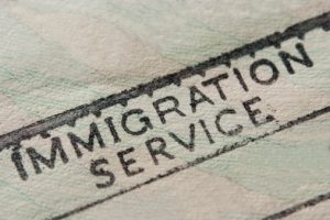 Immigration Service stamped on paper